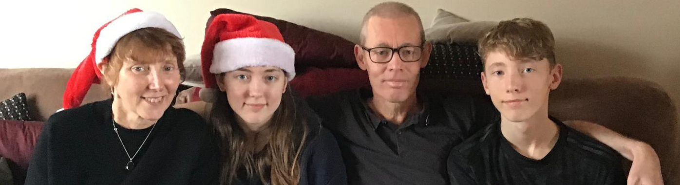 Dene Firth pictured with family members