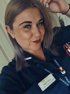 Megan in her work uniform; she loved to help other people.