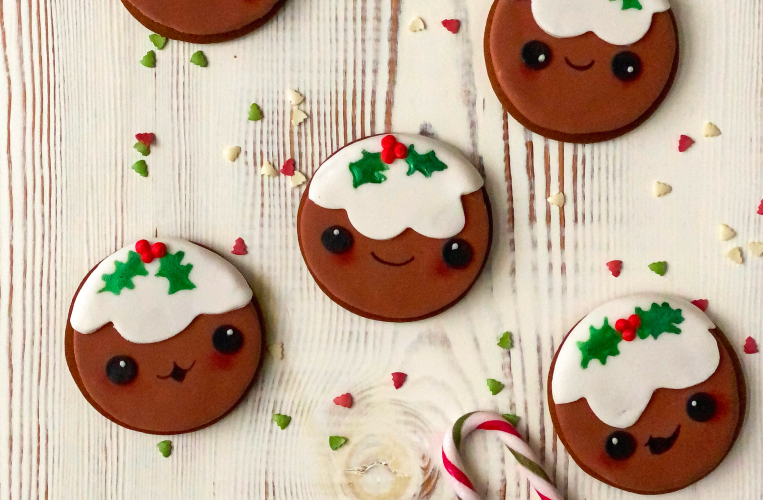 Individual Christmas Pudding ginger breads with cute faces showing different emotions