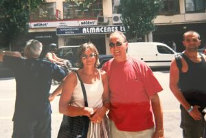 Brenda Batchelor and husband outside on holiday