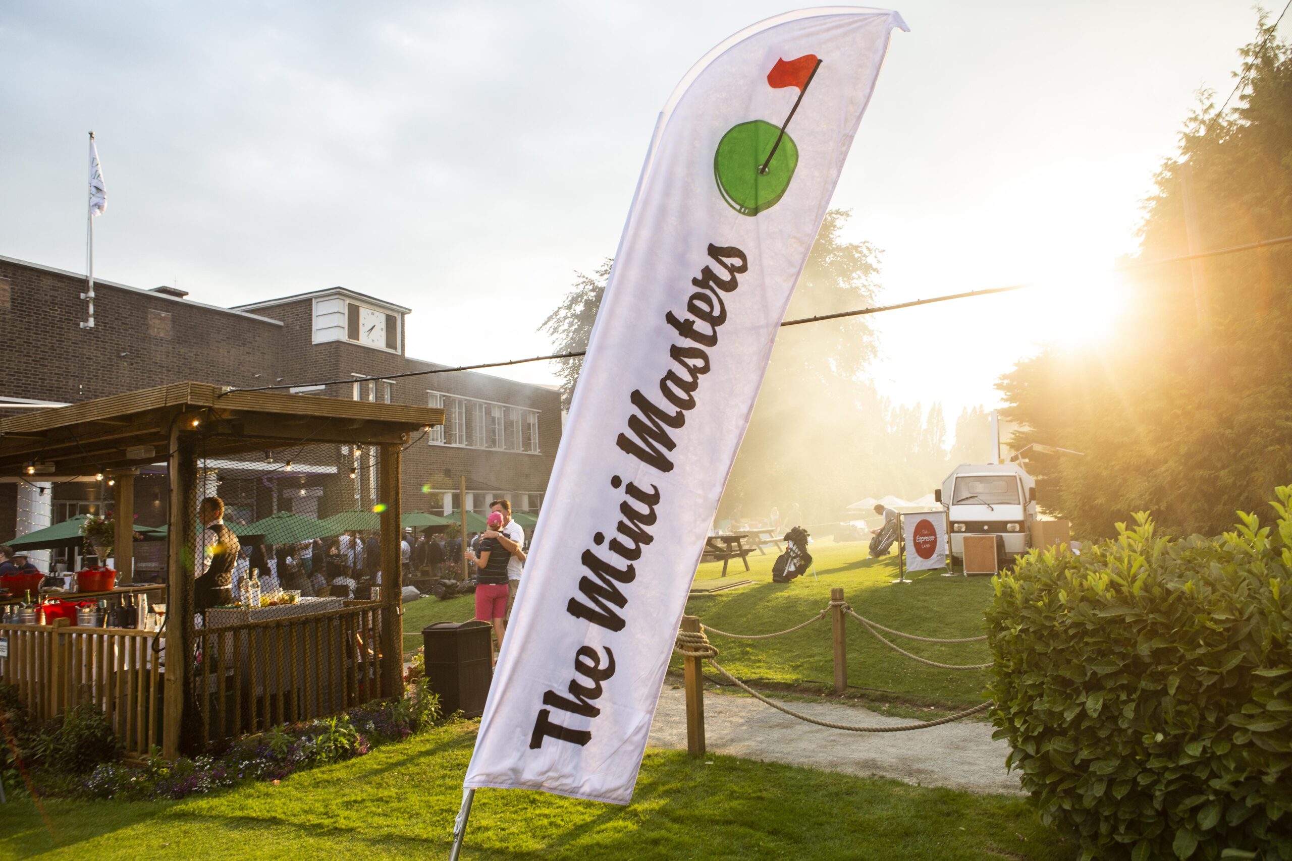 mini masters flag in the lawn on a sunny day