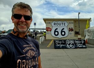 Andi next to the route 66 sign