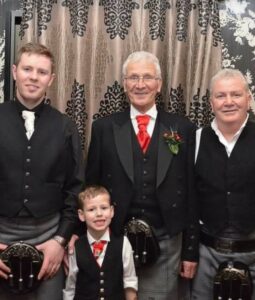 Bill-McGugan-four-generations-with-Dad-son-and-grandson