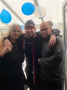 Luke with his mum and dad